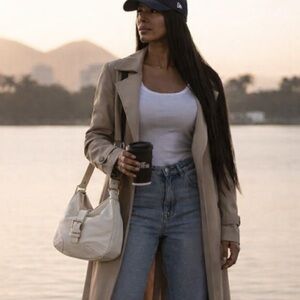 Michael Kors White Hobo Handbag With Magnetic Closure and Inner Pockets